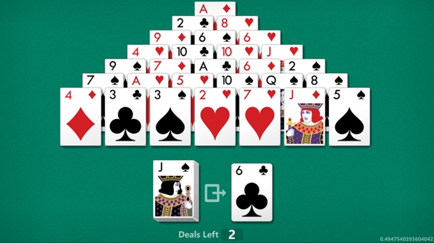 Pyramid Solitaire rules limit the use of the stock pile as indicated in the layout above.