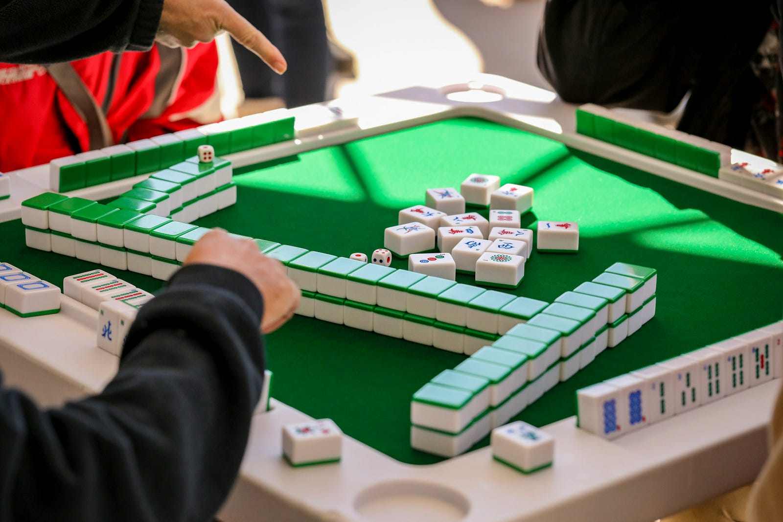 mahjong-playing-adults.jpg