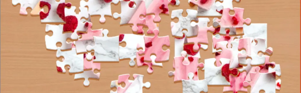 A closeup of a game of Arkadium’s Daily Jigsaw puzzle in progress